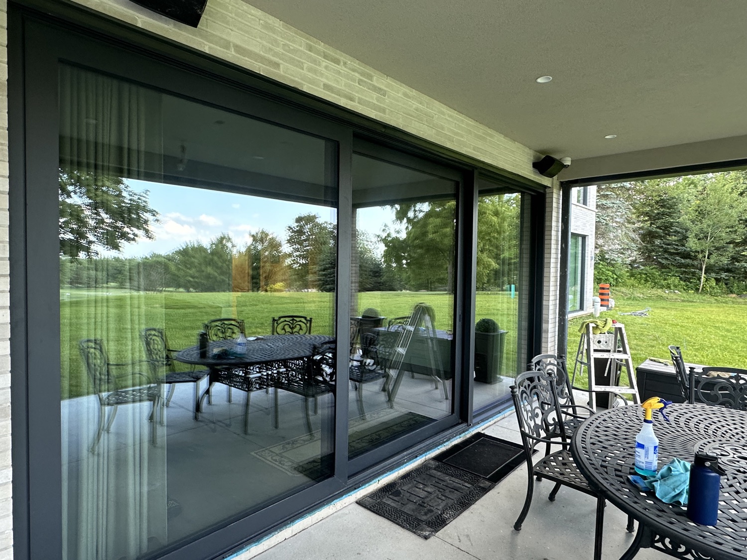 Wall of sliding glass doors, freshly cleaned