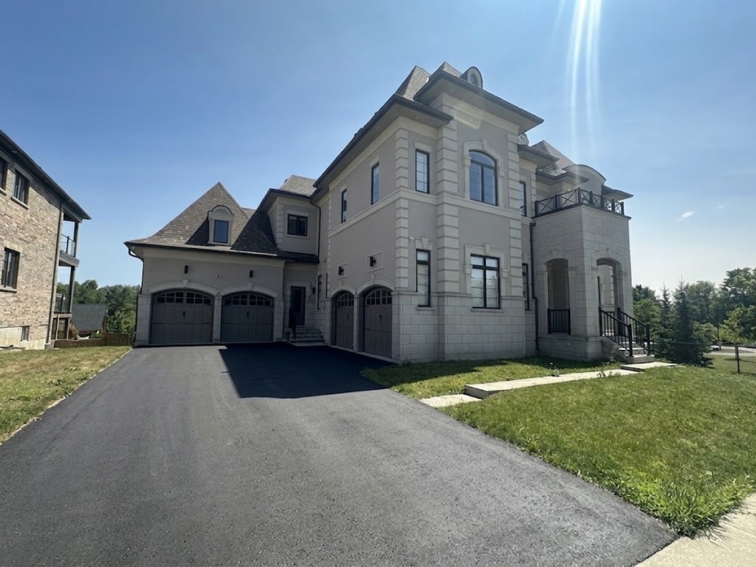 Grand stucco estate with clean windows