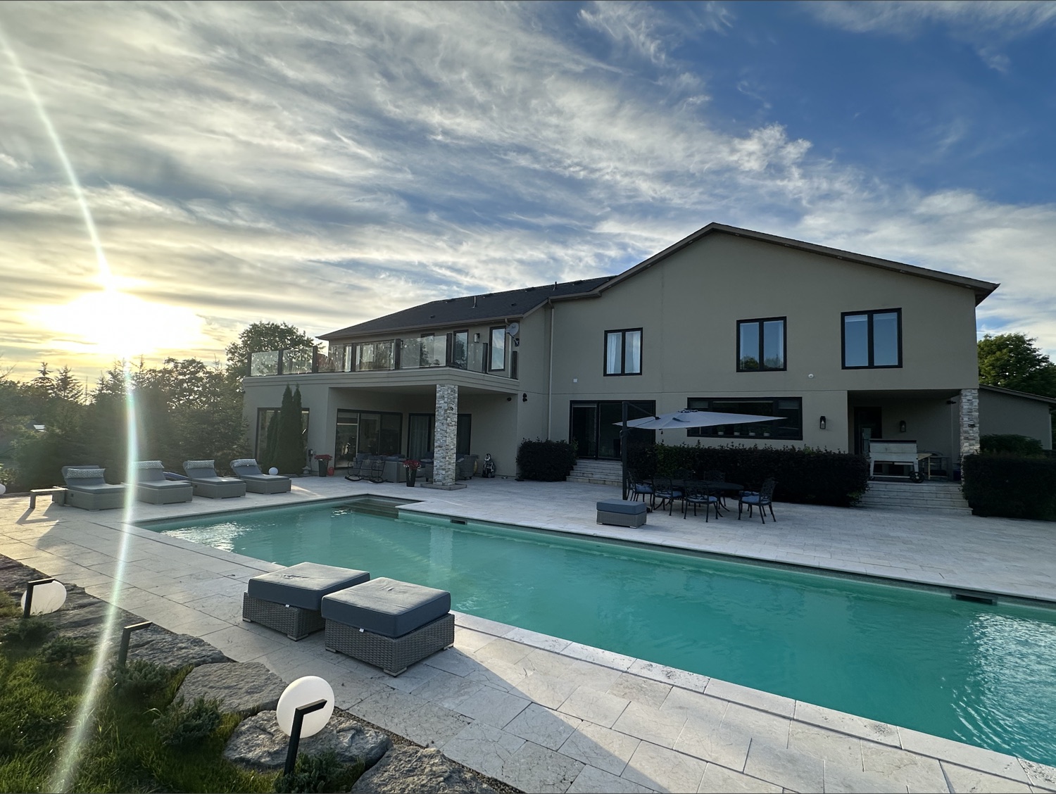 Modern home at golden hour with clean windows